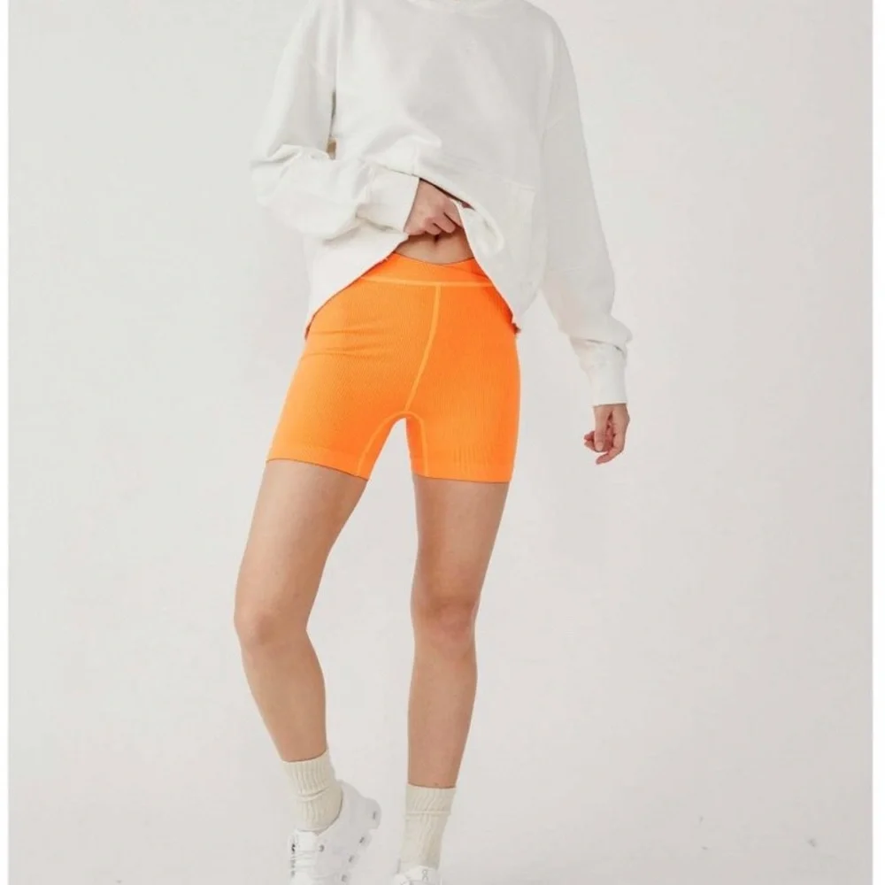 NWT Free People Free Throw Shorts Orange Burning Up size XS and L.